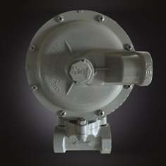 Two stage reducing valve